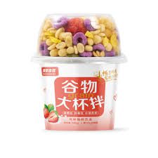 Colorful cereal cup with fruit pieces.