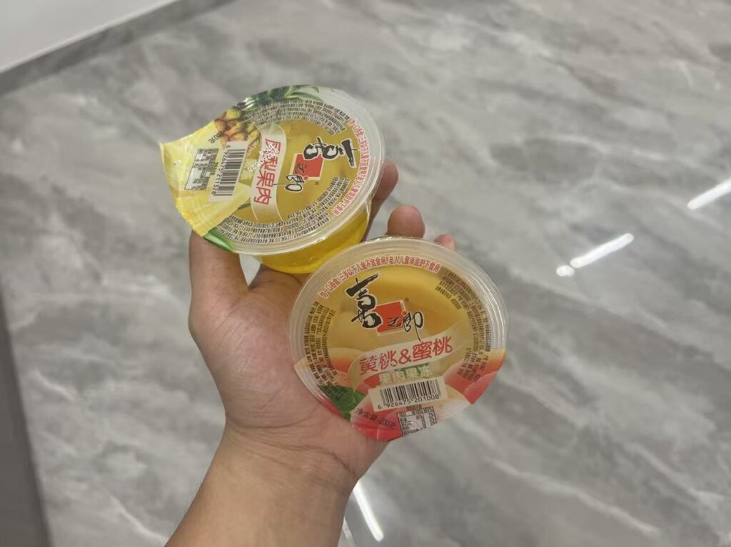 Close-up of a perfectly sealed jelly cup after pasteurization