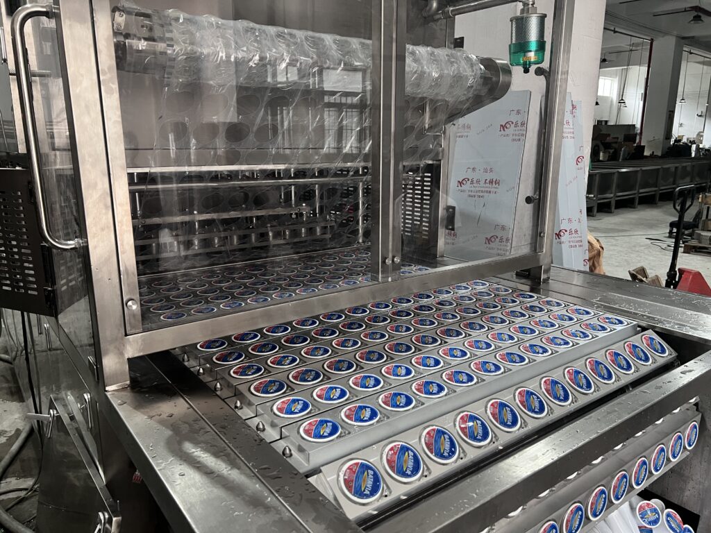 Diagram showing the automated steps of a cup filling machine