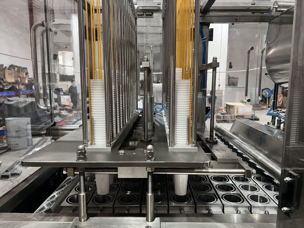 Stacks of empty PP plastic cups ready for filling