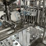 Close-up of stainless steel industrial machinery components.