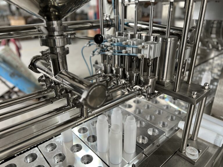 Close-up of stainless steel industrial machinery components.