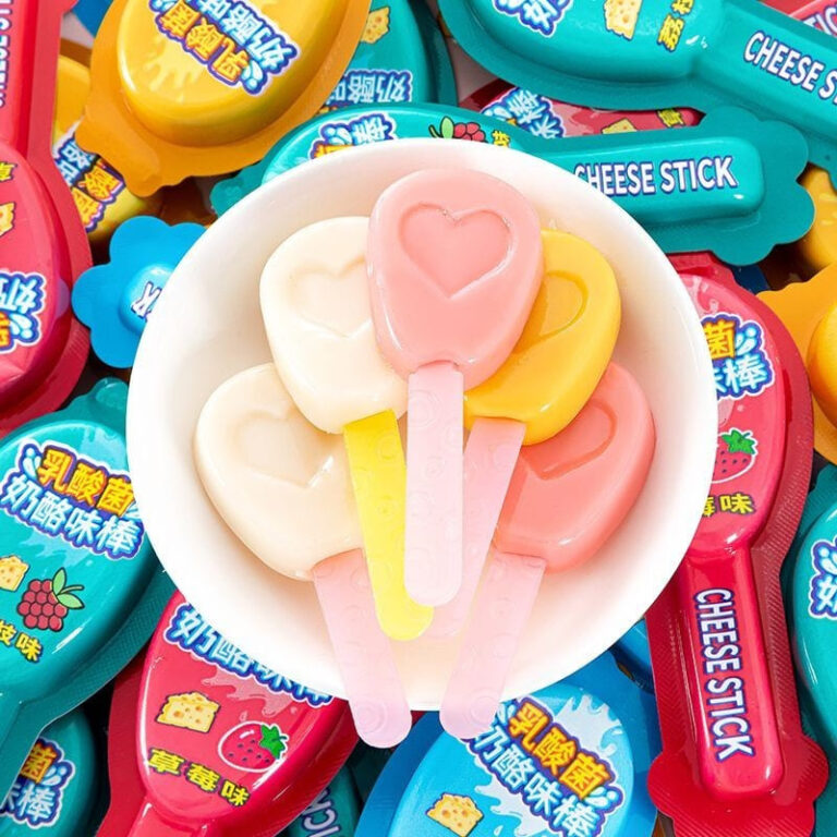 Colorful ice creams in a bowl with assorted flavors.