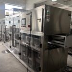 yougurt cup filling and sealing machine in factory