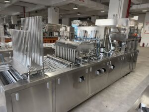 Jelly cup filling and sealing machine overview in factory