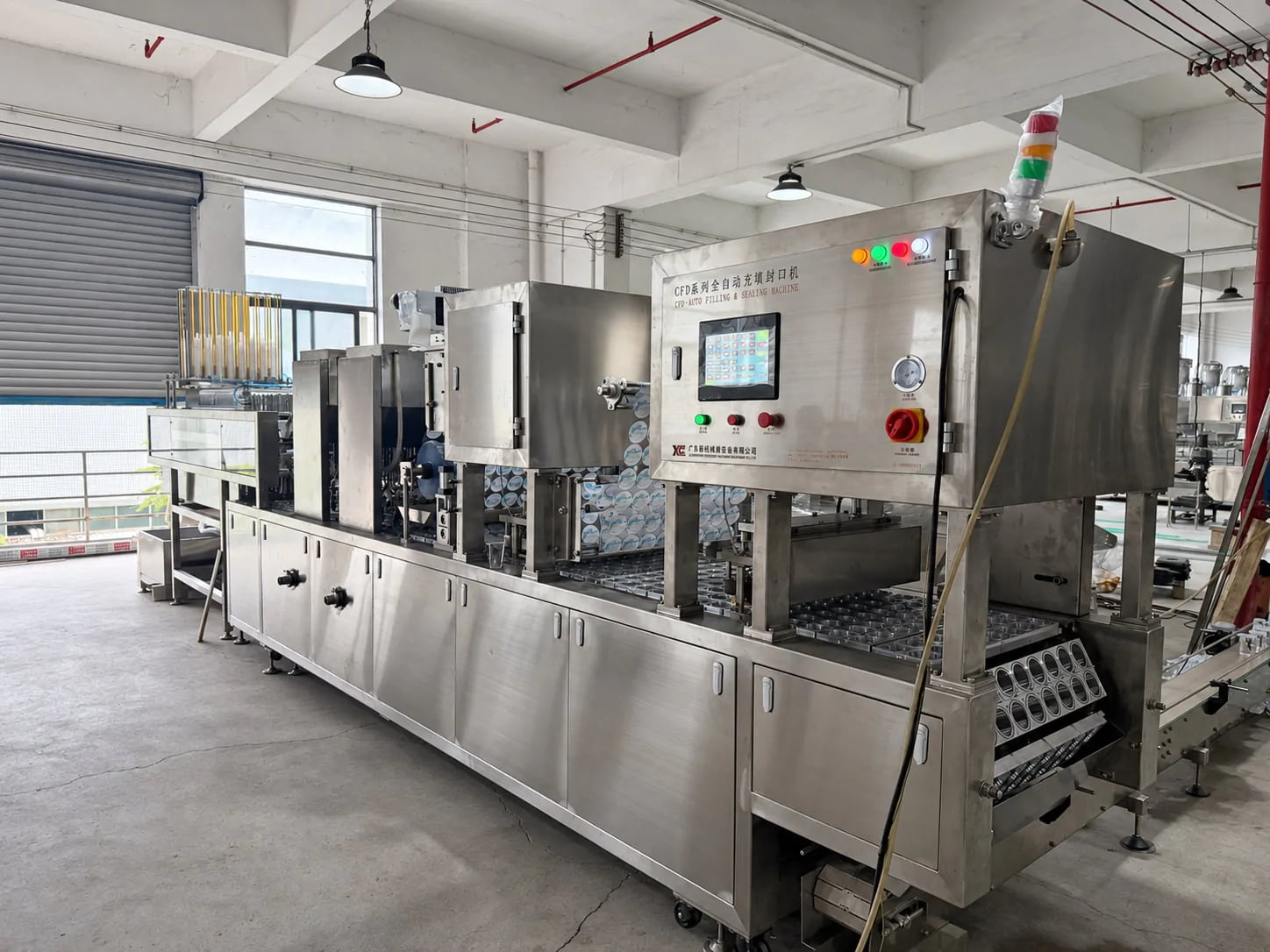 Xinchuang workshop view of a complete stainless-steel cup filling and sealing line