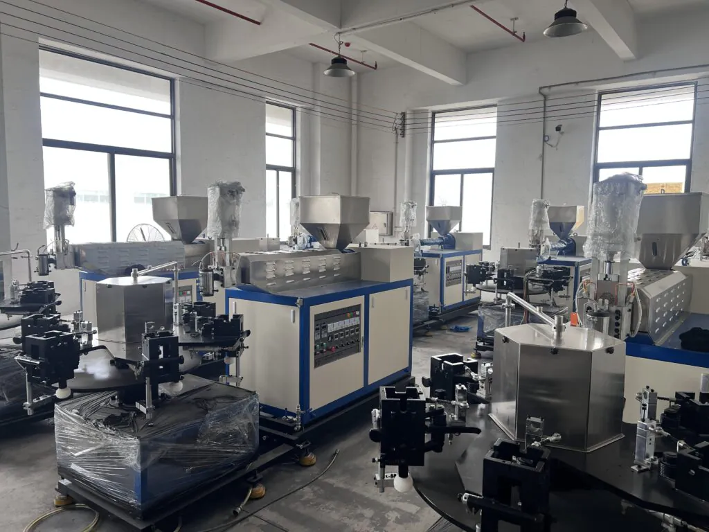 Plastic blowing machine for ice lolly tubes