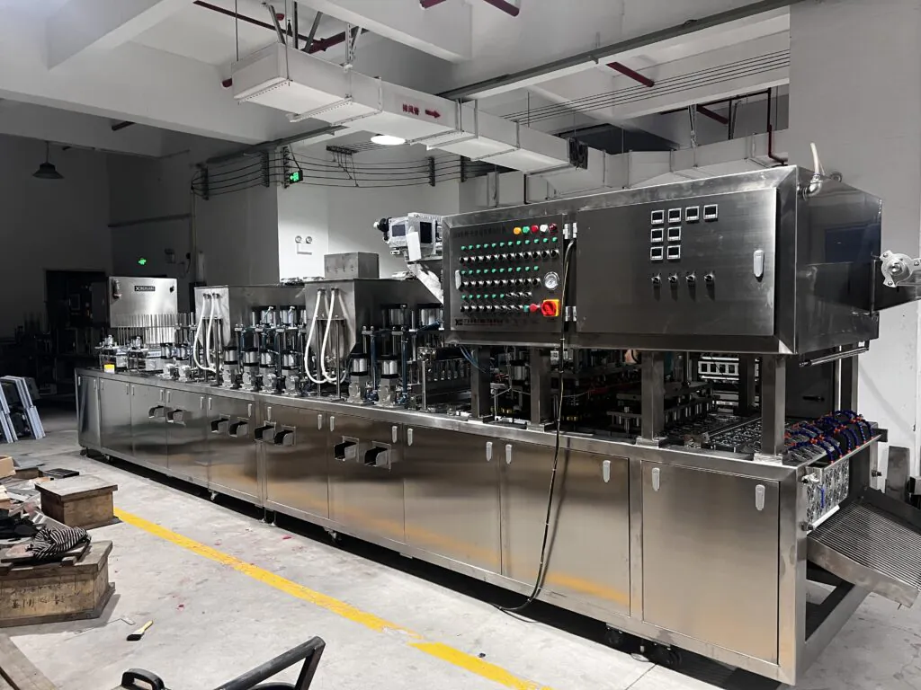Industrial bottling machine in factory setting
