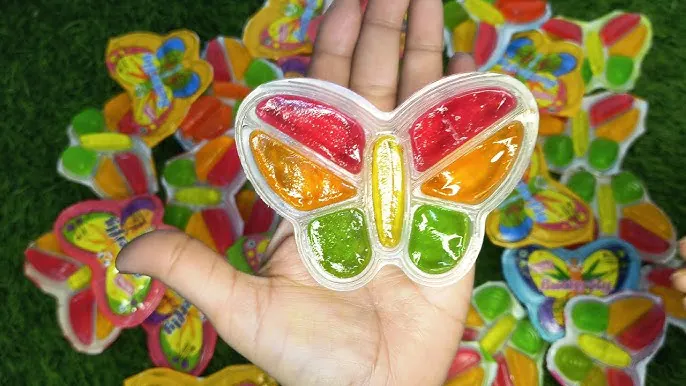 An eye-catching image of colorful butterfly jellies being produced by a machine