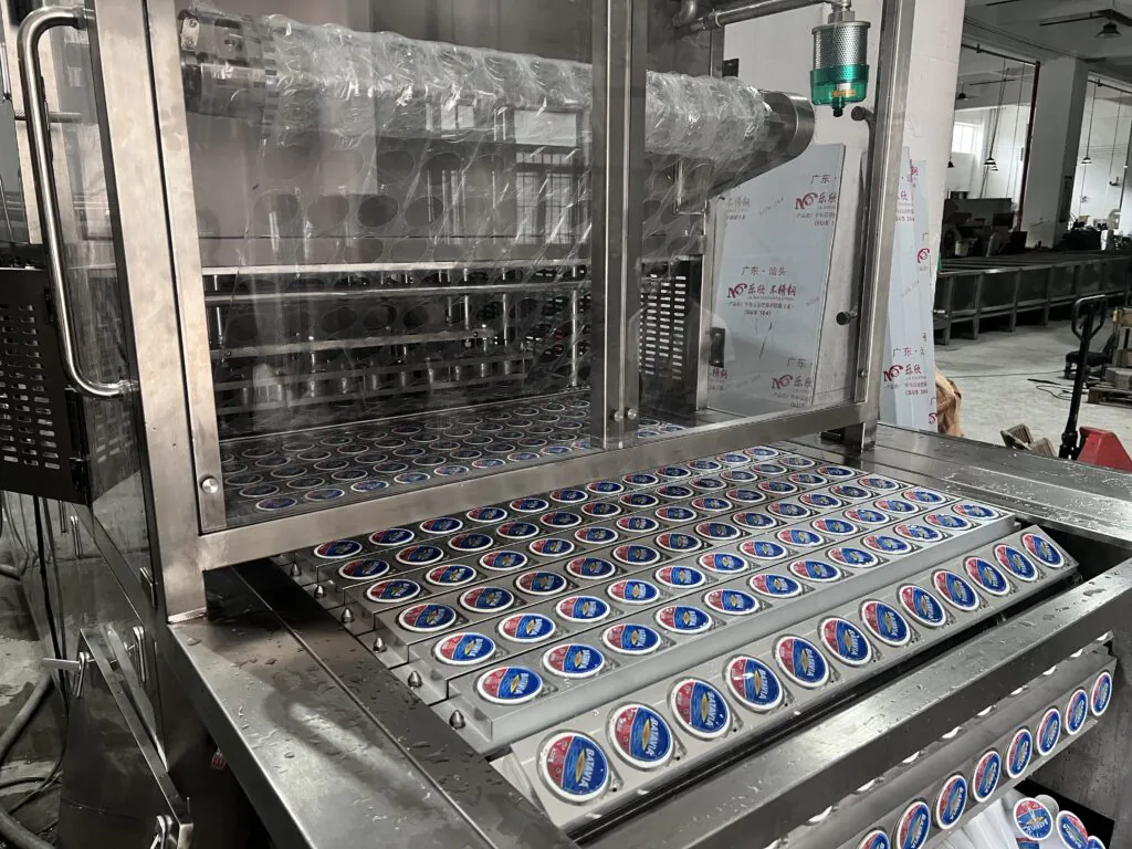 Diagram showing the automated steps of a cup filling machine