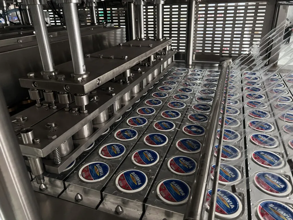 Close-up of the stainless steel components of a filling machine