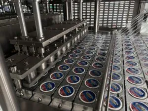 Industrial machinery packaging products efficiently.